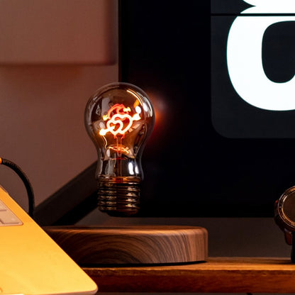 Warm glowing Cupid heart levitating bulb in nighttime ambient lighting