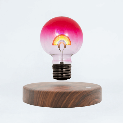 Rainbow light bulb magnetic levitating lamp on wooden base