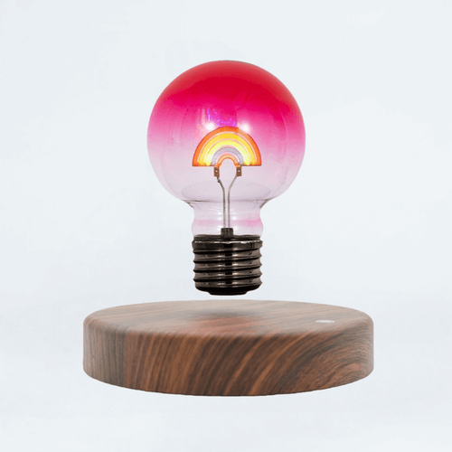 Rainbow light bulb magnetic levitating lamp on wooden base