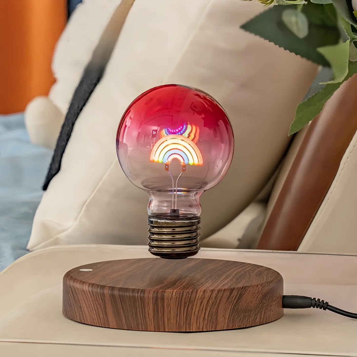 Rainbow magnetic levitating bulb lamp displayed on a desk