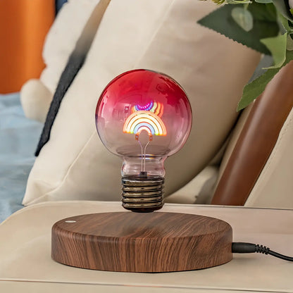 Rainbow magnetic levitating bulb lamp displayed on a desk