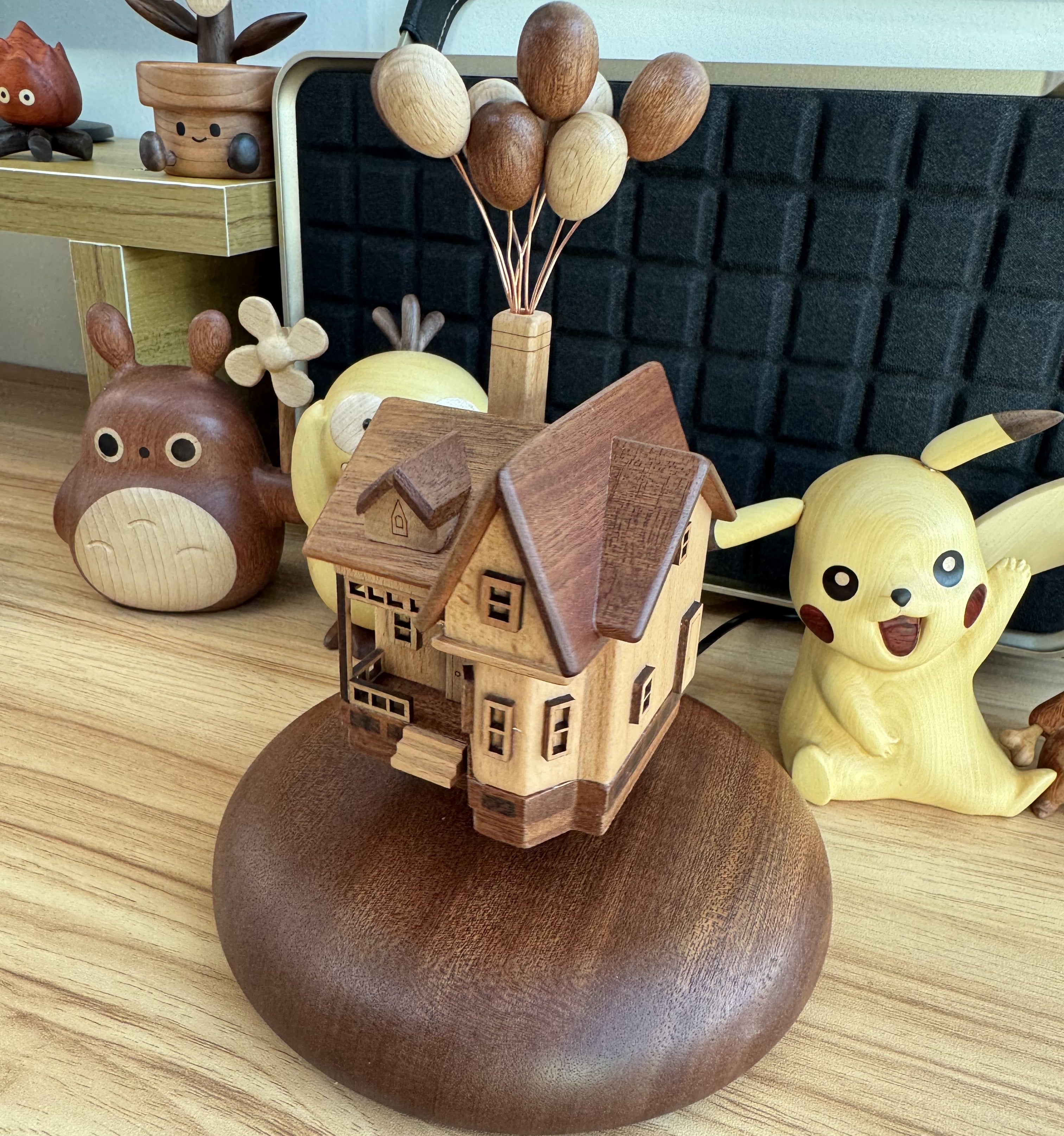 Magnetic levitating wooden balloon house toy with walnut and beech balloons, desk decor.