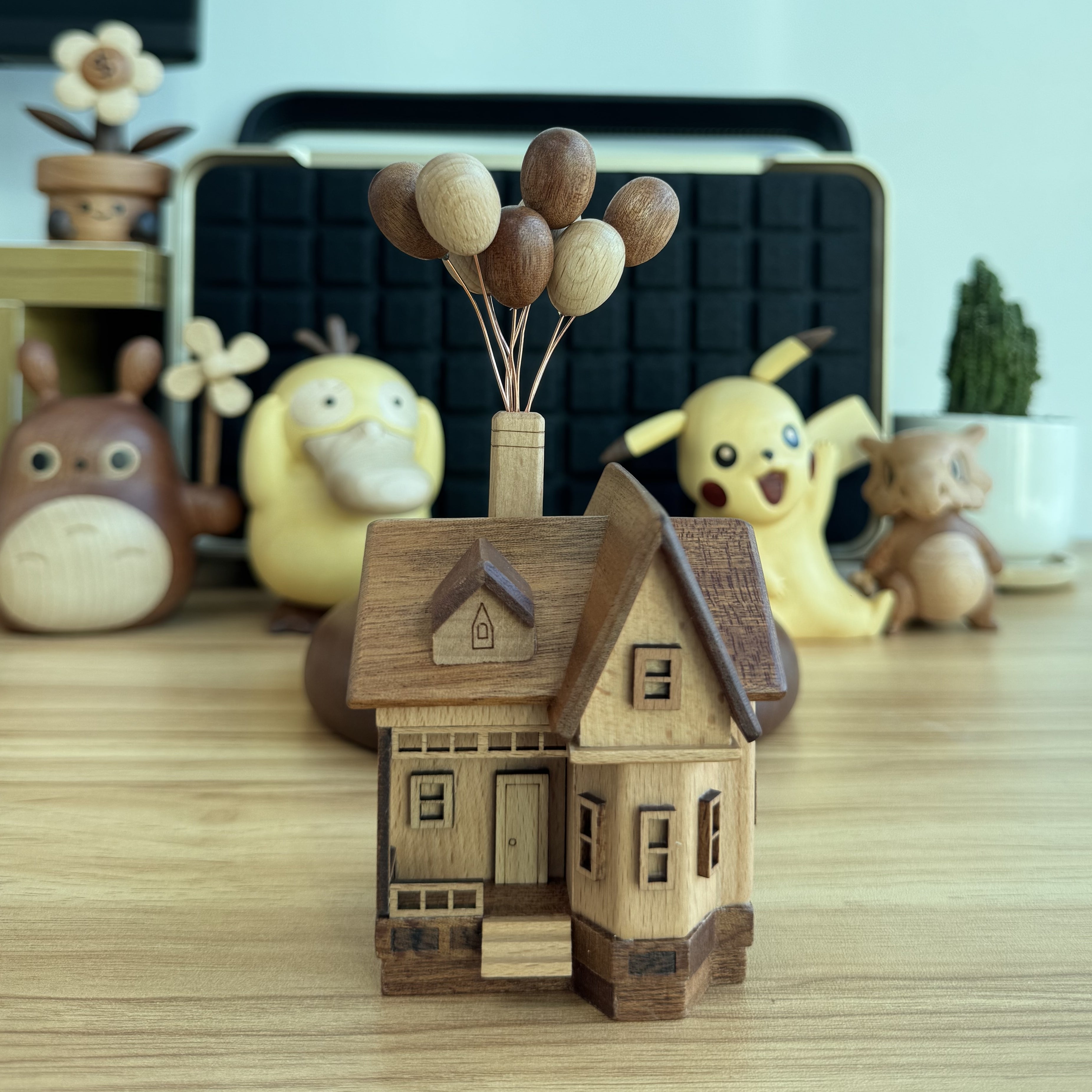 Magnetic levitating balloon house front view, handmade wooden floating desk decor gift.